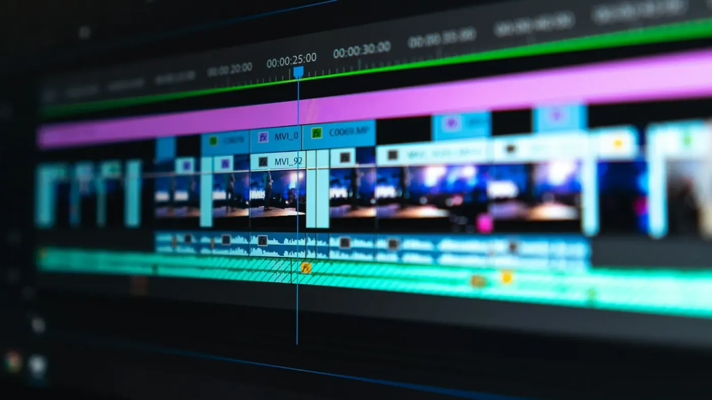 A video editing timeline on a dark screen